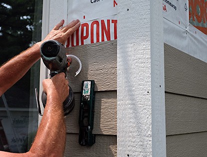 Applying Siding with a Nail Gun